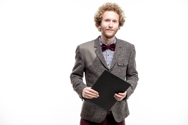 Young man holding clipboard - Photo, image