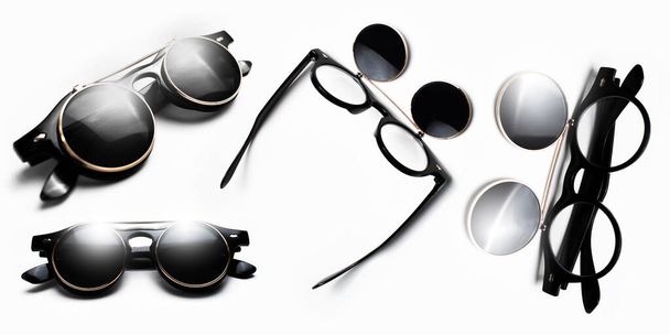 Collage di occhiali da sole rotondi hipster su sfondo bianco. - Foto, immagini