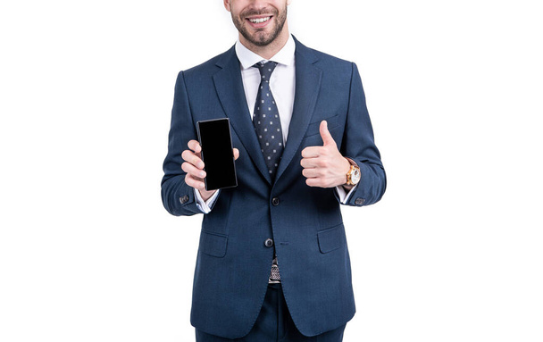 Happy businessman half face give thumbs up to approved mobile phone model, approval - Foto, immagini