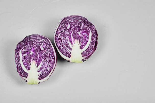 Fresh purple half sliced cabbage isolated on white background - Foto, afbeelding