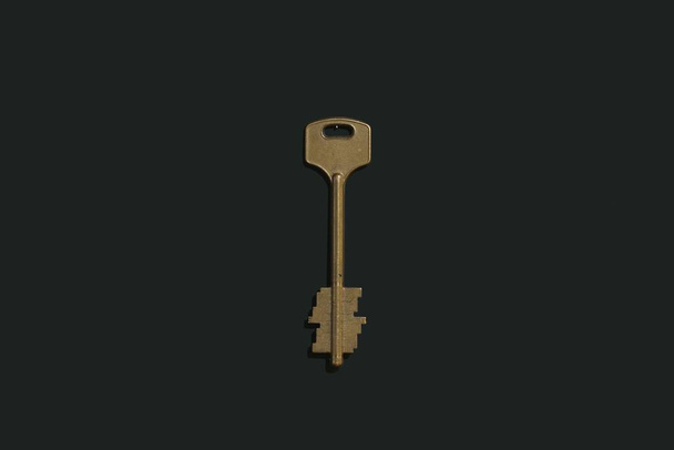 Вінтажний металевий ключ на чорному тлі
 - Фото, зображення