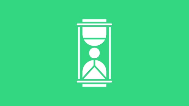 White Old hourglass with flowing sand icon isolated on green background. Sand clock sign. Business and time management concept. 4K Video motion graphic animation - Footage, Video
