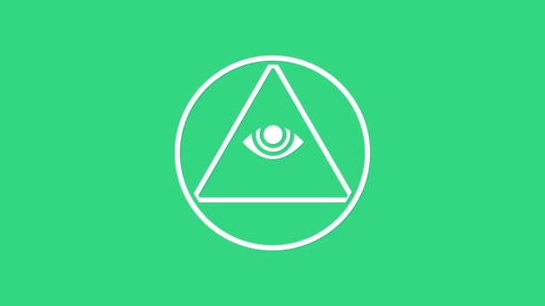 Witte Vrijmetselaars symbool Alziende oog van God pictogram geïsoleerd op groene achtergrond. Het oog van de Voorzienigheid in de driehoek. 4K Video motion grafische animatie - Video
