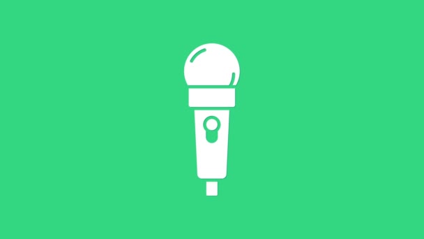 Icône Microphone blanc isolé sur fond vert. Sur micro micro radio. Signal haut-parleur. Animation graphique de mouvement vidéo 4K - Séquence, vidéo