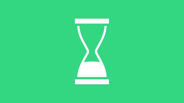 Yeşil zemin üzerinde kum ikonu olan beyaz kum saati. Kum saati işareti. İş ve zaman yönetimi kavramı. 4K Video hareketli grafik canlandırması - Video, Çekim