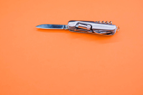 An isolated shot of the multifunctional pocket knives - Φωτογραφία, εικόνα