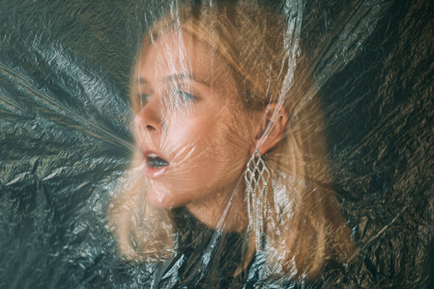female protection defocused anxious woman face - Valokuva, kuva