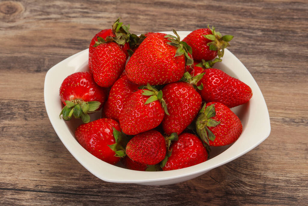 Sweet tasty strawberry in the bowl - Фото, зображення