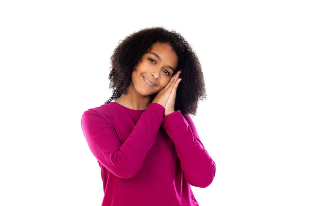 Beautiful teenager girl with pink sweater isolated on a white background - Fotó, kép