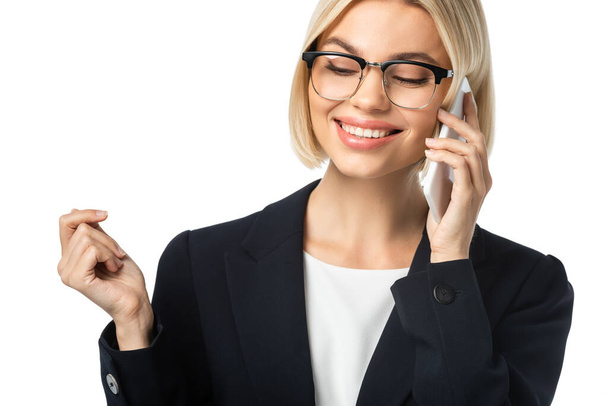 happy businesswoman in eyeglasses talking on mobile phone isolated on white - Zdjęcie, obraz