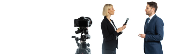 side view of blonde journalist interviewing young businessman isolated on white, blurred background, banner - Photo, Image