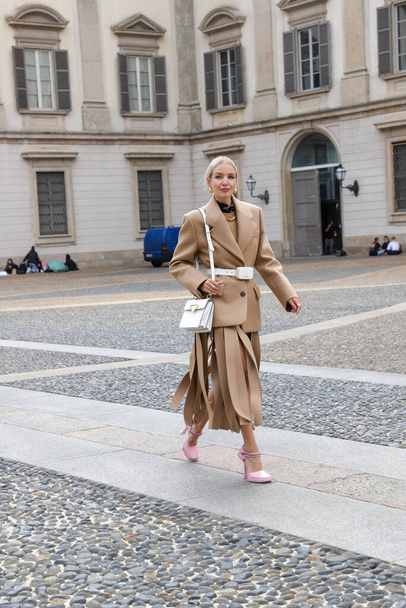 Milan Fashion Week. September 25, 2020, Milan, Italy : German Influencer Leonie Hanne is participating in several shows such as Max Mara, Fendi, Alberta Ferreti, Etro and Prada. Leone was doing a photographic service in front of the famous Museo del  - Foto, Imagem
