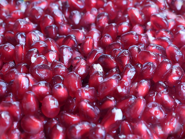 beautiful ripe grains of juicy tropical fruit pomegranate - Fotografie, Obrázek