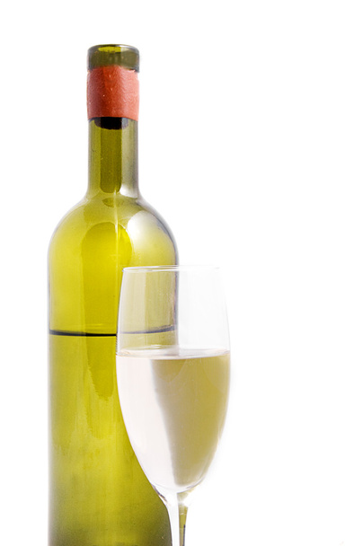White wine bottle with glass - 写真・画像