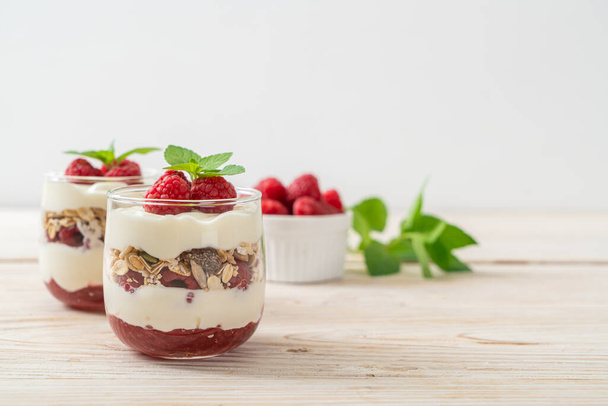fresh raspberry and yogurt with granola - Healthy food style - Fotoğraf, Görsel
