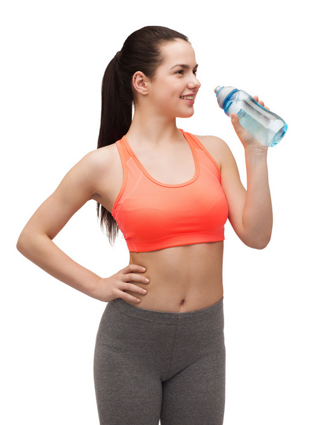 Sporty woman with water bottle - Fotoğraf, Görsel