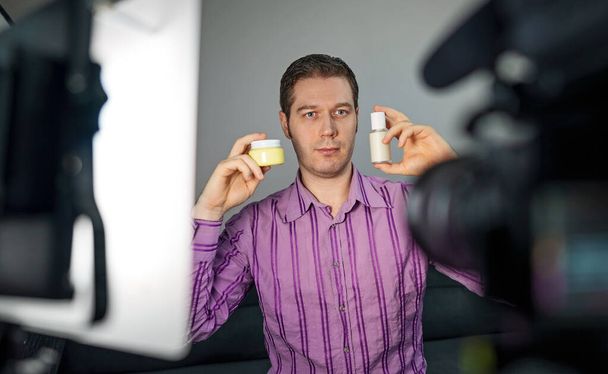 Man making video blog about skincare. Vlog concept. - Photo, Image
