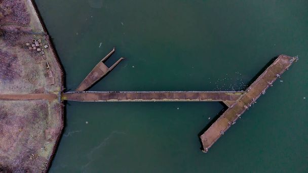 Looking down straight down from a drone on the banks of the River Orwell in Suffolk, UK - Photo, Image