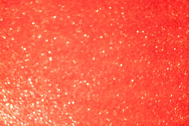 Tarjeta de Navidad de fondo rojo brillante. Brillo de luz. Hermosa textura de brillo rojo abstracto de vacaciones brillantes. Fondo brillante. - Foto, Imagen