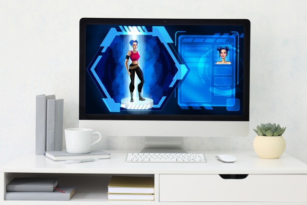Σύγχρονη χώρο εργασίας του σχεδιαστή βιντεοπαιχνιδιών με υπολογιστή στο στούντιο - Φωτογραφία, εικόνα