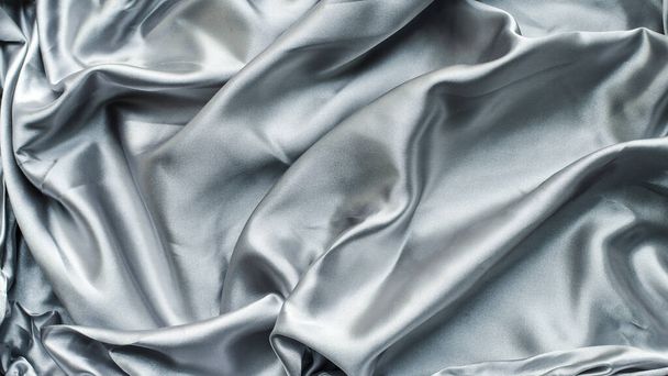 Grey silk or satin fabric background - Foto, afbeelding