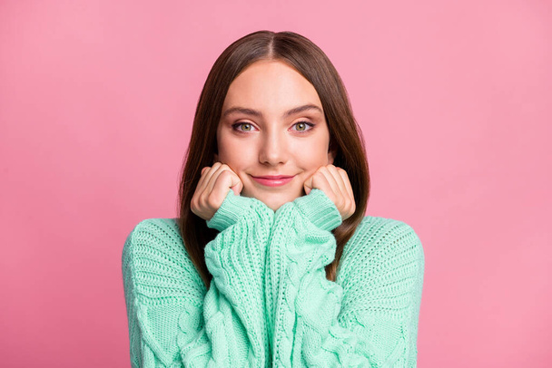 Close up portrait of gorgeous young person hands on cheeks smile wear turquoise isolated on pink color background - Foto, imagen