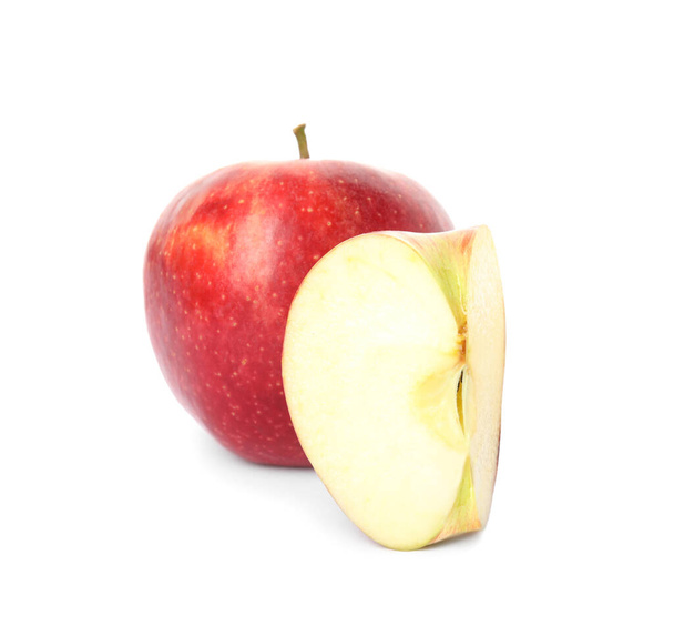Fresh ripe red cut and whole apples isolated on white - Valokuva, kuva