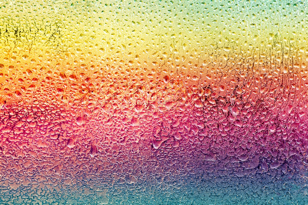 Colorful drops on the glass. Transparent wet surface - Photo, Image