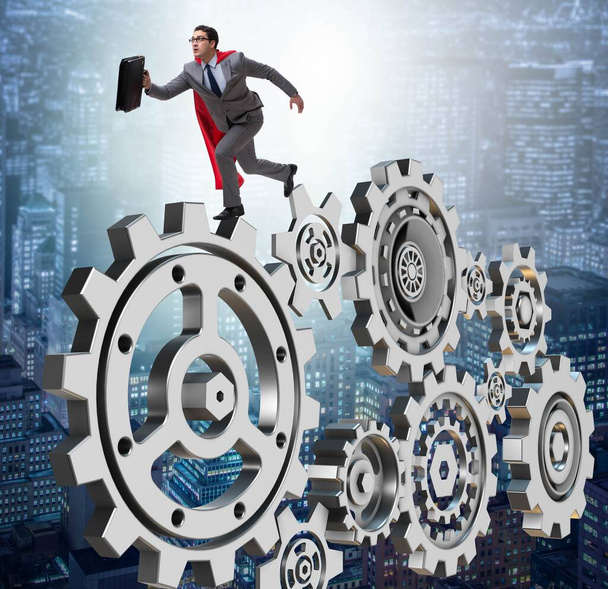 Businessman in teamwork concept with cogwheels - Photo, Image