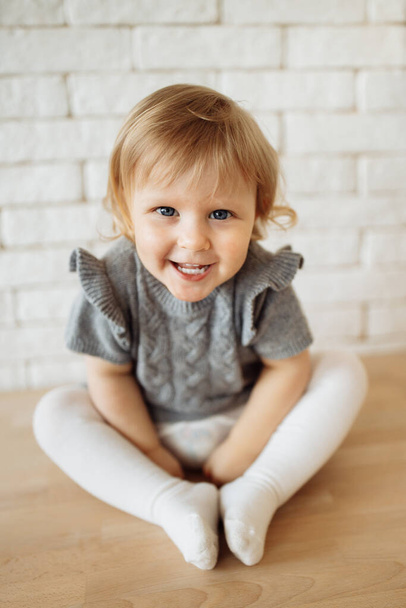 portrait of a cute little girl  at home  - Fotó, kép