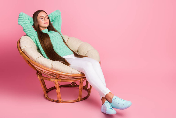 Full length portrait of sleepy person hands behind head teal sweater isolated on pink color background - Foto, Imagem