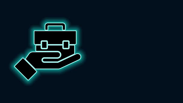Glowing neon line Hand holding briefcase icon isolated on black background. Insurance concept. Security, safety, protection, protect concept. 4K Video motion graphic animation - Footage, Video