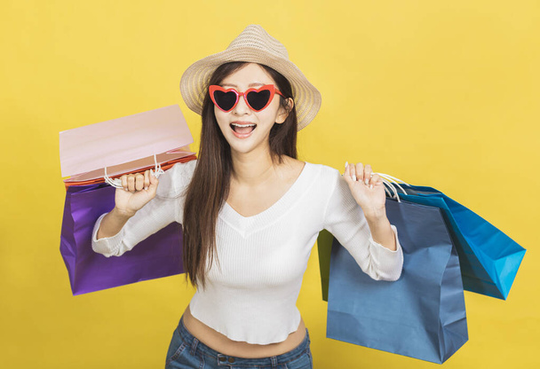 Happy Beautiful young woman with shopping bags - Φωτογραφία, εικόνα