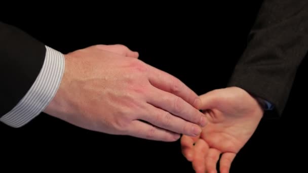Close-up de empresários apertando as mãos. Aperto de mão após negociações bem sucedidas - Filmagem, Vídeo