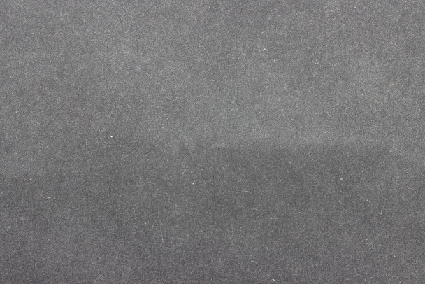 Texture of rough gray paper with spots and fibers. - Valokuva, kuva