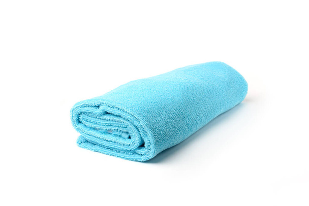 Blue towel isolated on white background. - Photo, Image