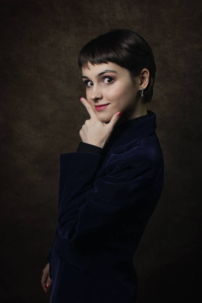 Female portrait. Young woman with short haircut. Businesswoman. Women's Business suit - Фото, изображение