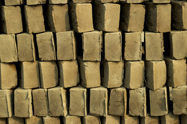 The earliest bricks were dried brick, meaning that they were formed from clay-bearing earth or mud and dried - Photo, Image