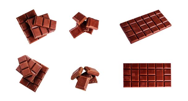 Saboroso chocolate preto de leite doce no fundo branco, conjunto - Foto, Imagem