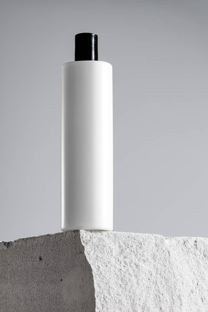 Cosmetic jar on gray cinder block close up - Φωτογραφία, εικόνα