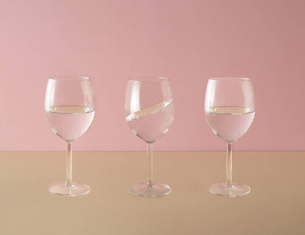 Be different. Tree glasses, on a pastel background. creative concept. Minimal. - Photo, Image