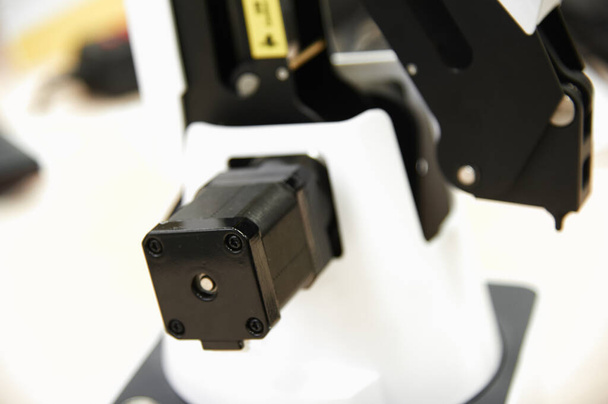 Desktop robot manipulator stepper motor close-up. - Foto, afbeelding