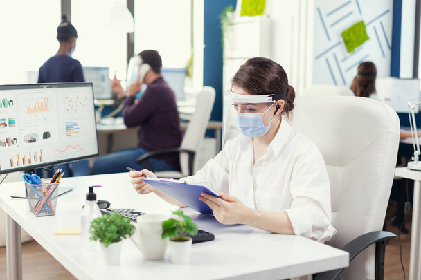 Entrepreneur wearing face mask against covid19 - Photo, image