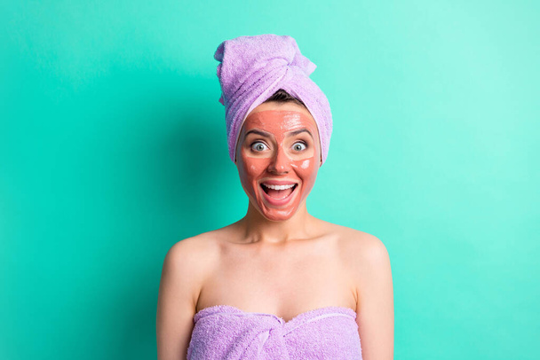 Photo of charming funny lady impressed open mouth violet towel isolated on turquoise color background - Fotoğraf, Görsel
