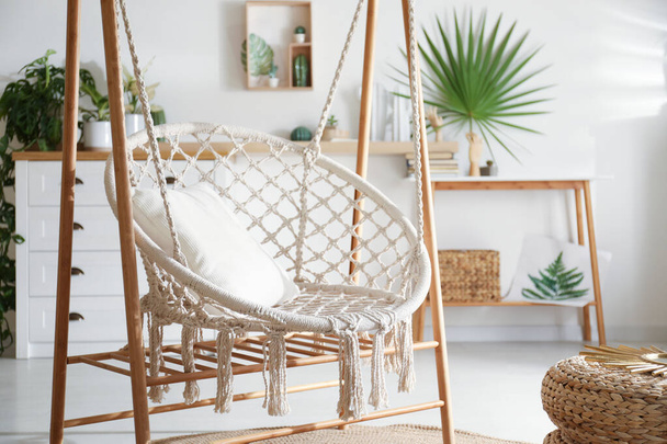 Comfortable hammock chair in stylish room. Interior design - Photo, image
