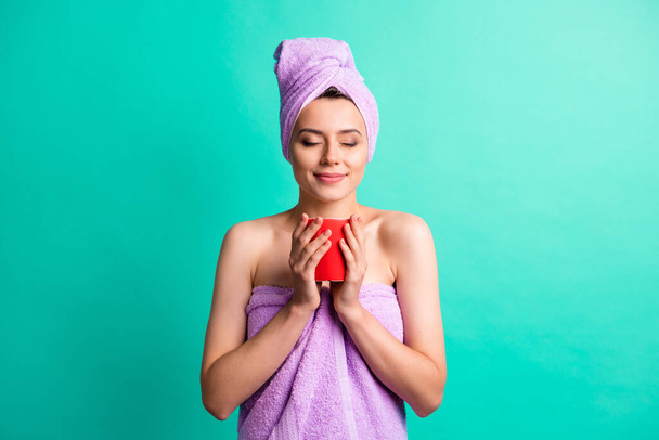 Photo of sweet lady after taking shower drink cacao smelling flavor inspired wear violet towels isolated teal color background - Fotografie, Obrázek