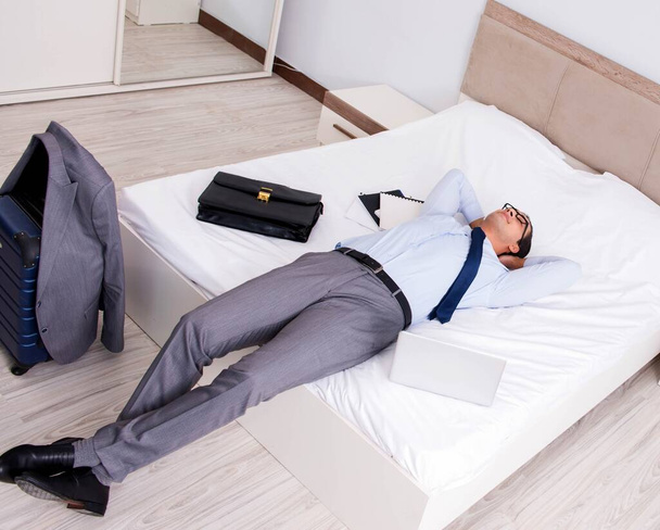 Businessman working in hotel room - Photo, Image