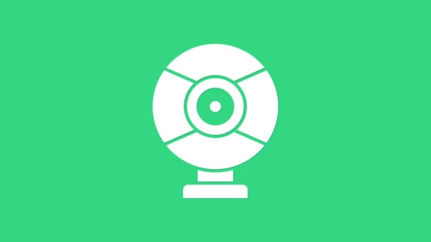Fehér biztonsági kamera ikon elszigetelt zöld alapon. 4K Videó mozgás grafikus animáció - Felvétel, videó