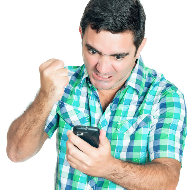 Angry man punching his mobile phone - Fotó, kép
