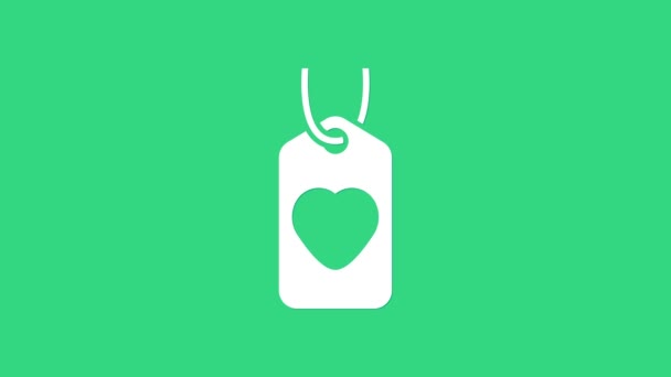 Ikona białego serca wyizolowana na zielonym tle. Symbol miłości. Symbol walentynkowy. 4K Animacja graficzna ruchu wideo - Materiał filmowy, wideo